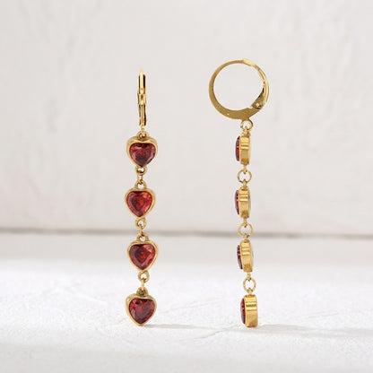Boucles d’oreilles en acier inoxydable 316L pendantes avec cœurs rouges et finition dorée - KENVIA